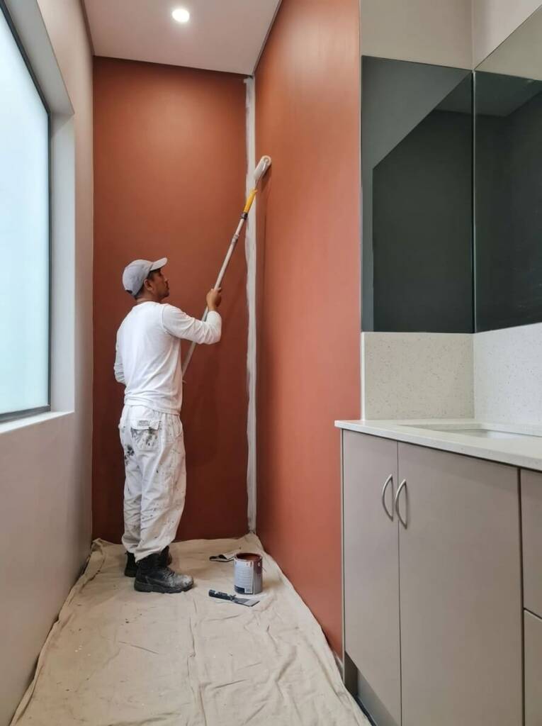 Interior Painting Adelaide - man painting the interior of a house in adelaide