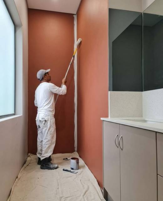 Interior Painting Adelaide - man painting the interior of a house in adelaide