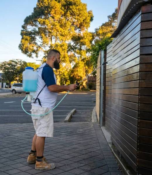 Paintperfectionist worker painting a house in adelaide